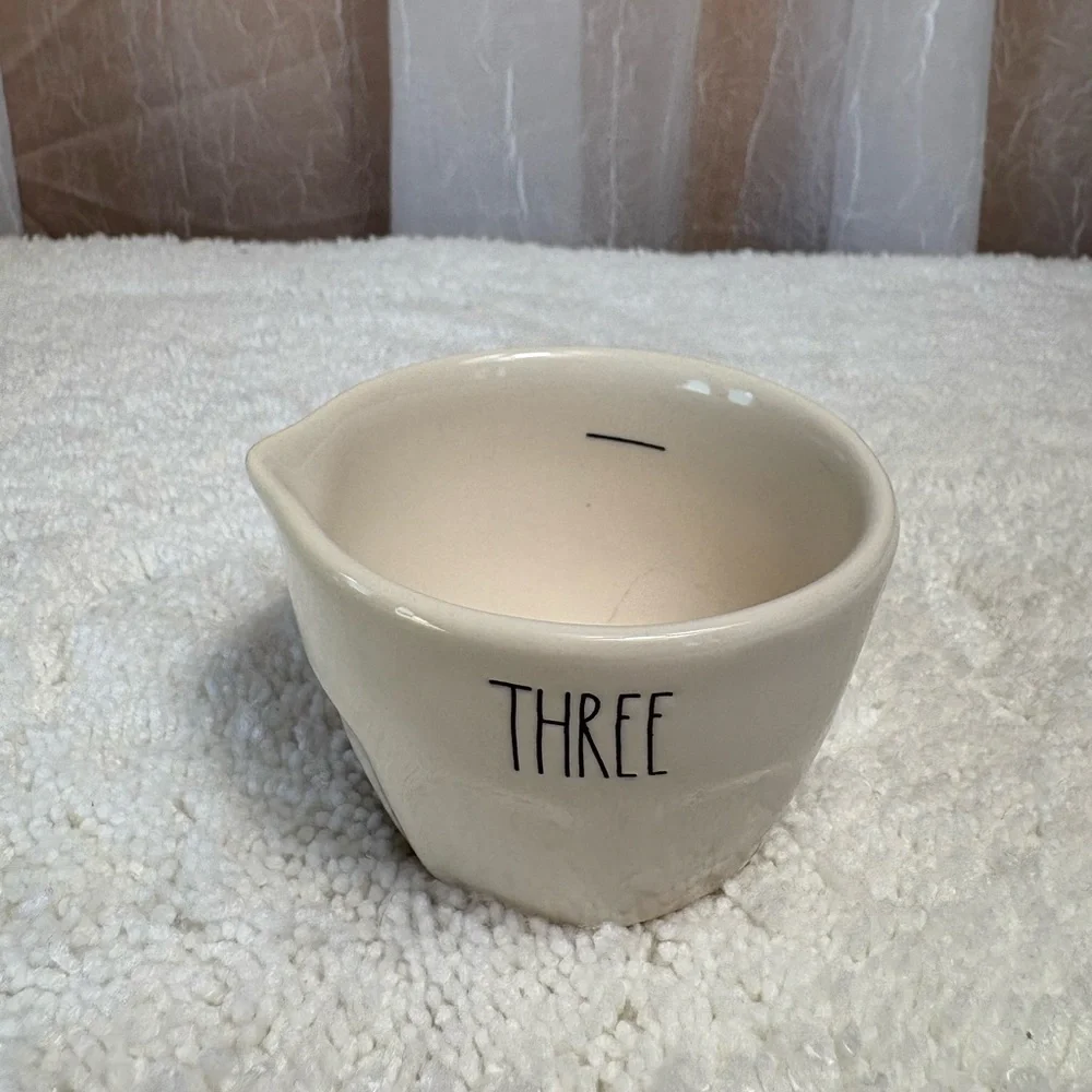 Rae Dunn Artisan Collection Measuring Cups. 4-Piece Set of White Ceramic Cups.